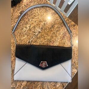 Like new NINE WEST Gray and black envelope Handbag with silver hardware.
